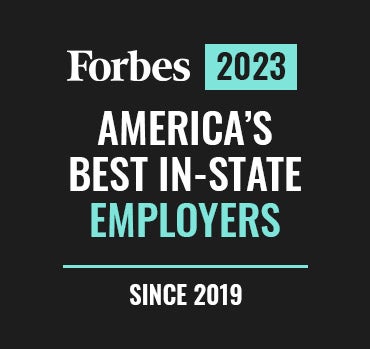 a black and white sign with white text