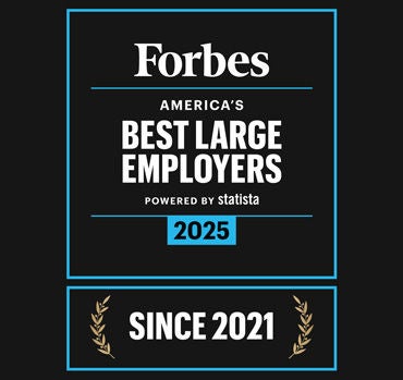 a black and white sign with red text