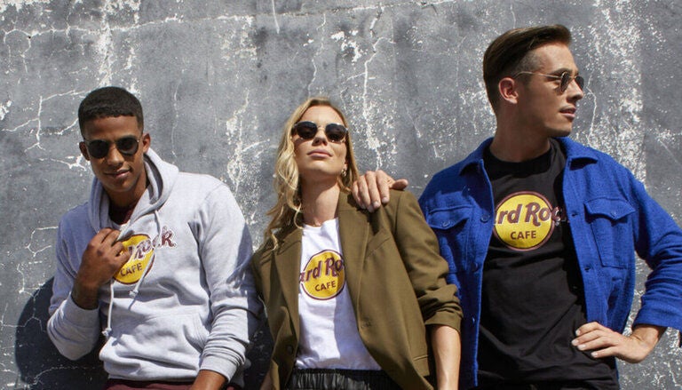 2 men and a woman standing